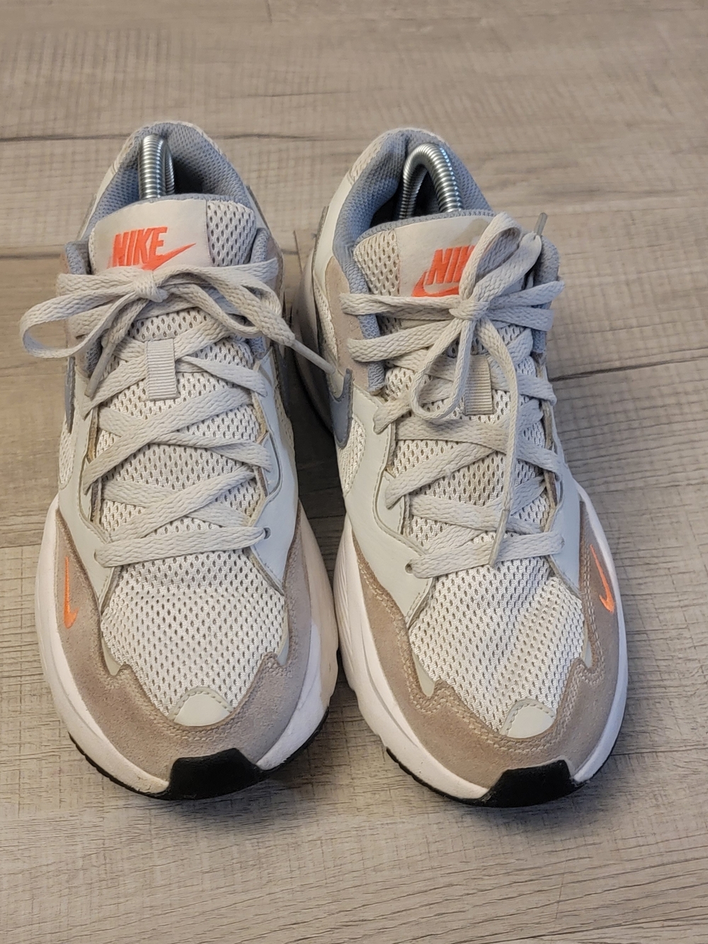 Nike Kids' Gray and Beige Running Shoes with Orange Accents